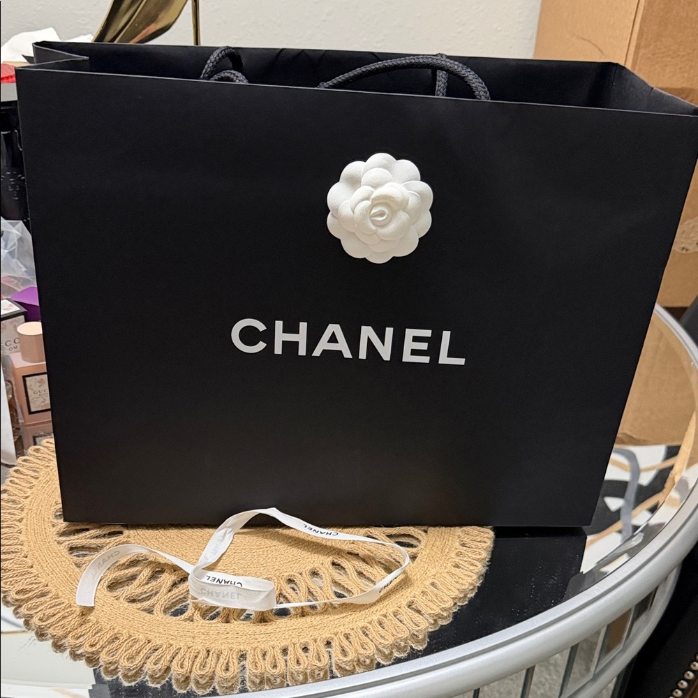 CHANEL Black Bag with White Camellia